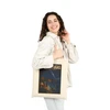 Natural cotton canvas Dry Tortugas National Park tote bag featuring MOMENT No. 003 shark and nighttime fishing artwork.