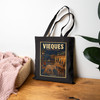 Black cotton canvas Vieques Island Puerto Rico tote bag featuring MOMENT No. 005 wild horse artwork.