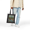 Black cotton canvas Brooks Camp Katmai Alaska tote bag featuring MOMENT No. 006 brown bear and salmon artwork.