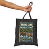 Black cotton canvas Brooks Camp Katmai Alaska tote bag featuring MOMENT No. 006 brown bear and salmon artwork.