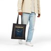 Black cotton canvas Keauhou Bay Kona Hawaii tote bag featuring MOMENT No. 008 manta ray night dive artwork.