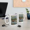 11 oz white ceramic Brooks Camp Katmai Alaska coffee mug featuring MOMENT No. 006 brown bear and salmon artwork.