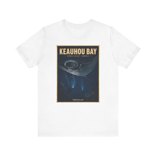 Keauhou Bay Kona Coast Hawaii manta ray T-shirt featuring vintage-inspired MOMENT No. 008 artwork with manta rays and divers in illuminated nighttime ocean water.