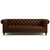 A Chesterfield-style sofa in rich, brown tufted leather is showcased against a clean white background. The couch features classic rolled arms, deep button tufting, and turned wooden legs, emphasizing its traditional craftsmanship and luxurious design.