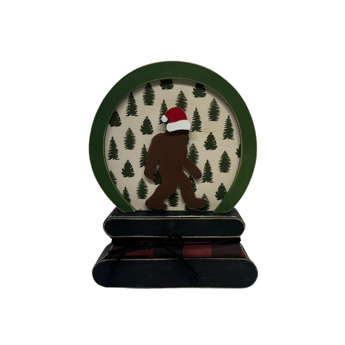 Santa Bigfoot snow globe