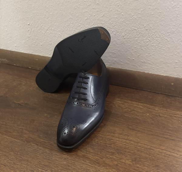 Customer wearing bold custom dress shoes