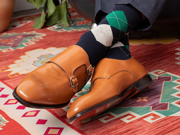Customer wearing bold custom dress shoes