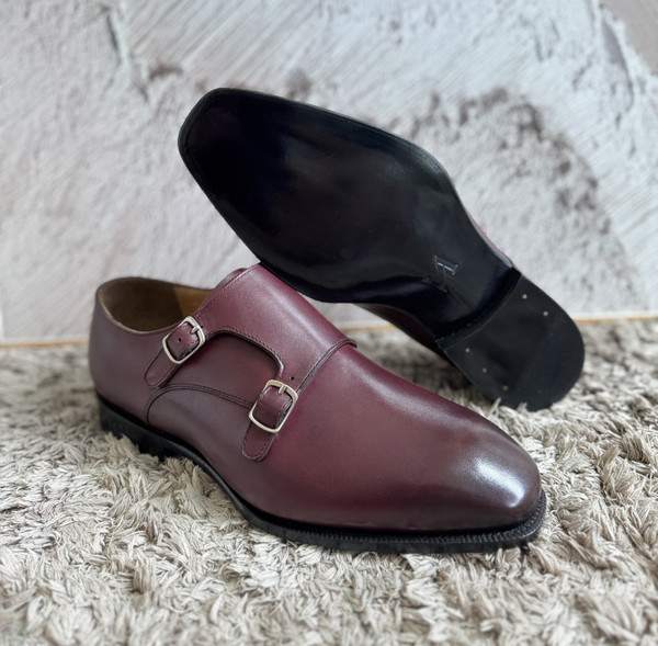 Customer showcasing burnished burgundy custom dress shoes
