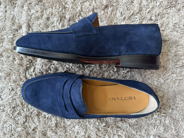 Customer showing off their custom blue dress shoes