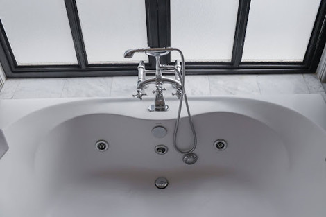 How to Install a Tub Filler with Silicone Sealant