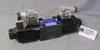 (Qty of 1) DSG-01-3C4-D24-N1-7090 Yuken interchange D03 hydraulic solenoid valve 4 way 3 position, A & B OPEN to TANK, P Blocked  24 VOLT DC