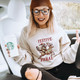 Women's 'Festive but Feral' Graphic Sweater with Racoon and Reindeer product
