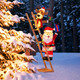 5.5 ft Lighted Reindeer and Santa Claus on Ladder  product