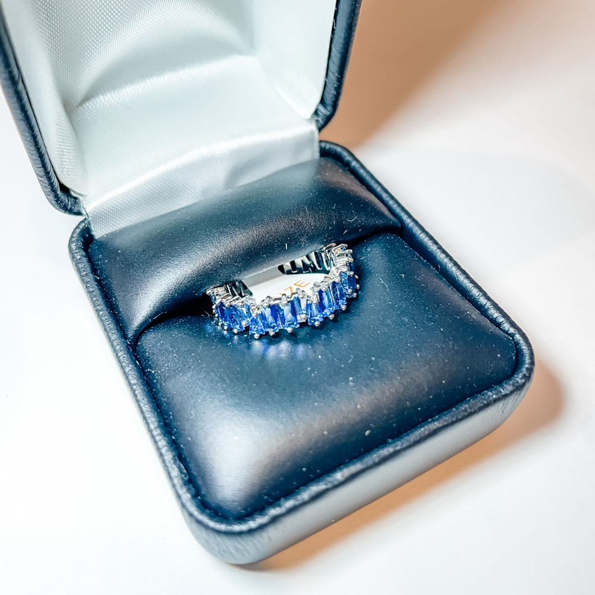 Baguette CZ Eternity Bands - Silver Band & Blue Stone Size 8