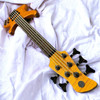 Yamaha TRBX 605FM 5-String Bass, Matte Amber w/ Rosewood.