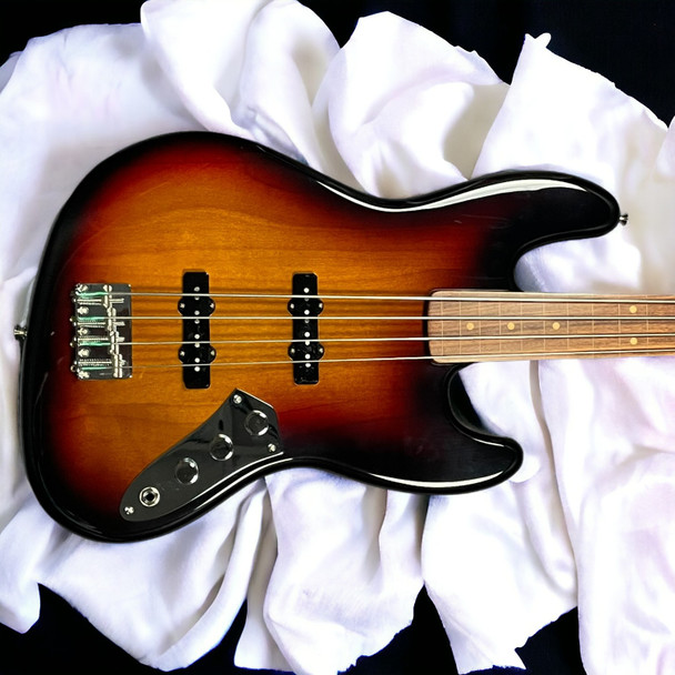 Fender Jaco Pastorius Fretless Jazz, 3-Tone Sunburst w/ Pau Ferro 4 String Fretless Bass At Bass Central