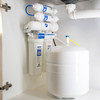 Cirrus 5-stage Reverse Osmosis system with tank installed underneath a kitchen sink