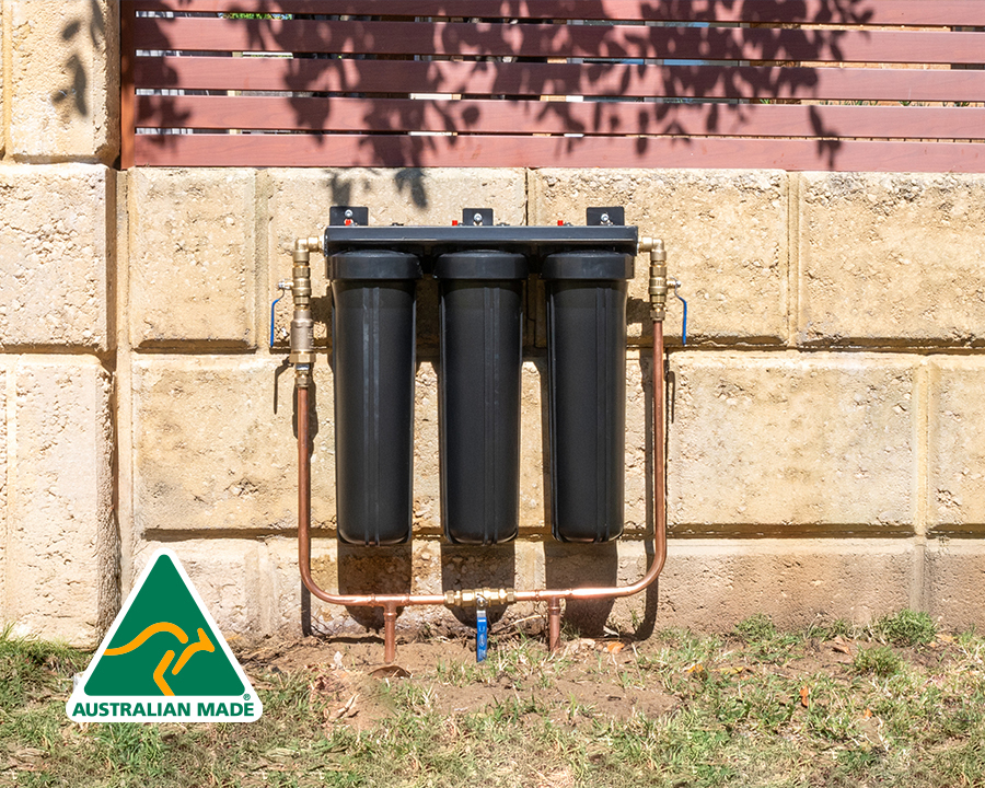 A Cloudtap Essential Series system mounted outside on a beige stone wall