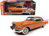 1957 Studebaker Gold Hawk Coppertone Orange and White 1/18 Diecast Model Car by Autoworld