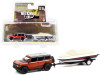2021 Ford Bronco Wildtrak Rapid Red Metallic with Gray Top with Boat on a Trailer "Hitch & Tow" Series 23 1/64 Diecast Model Car by Greenlight