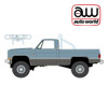 1/64 Auto World 1987 Chevrolet Chevy Silverado Fleetside 4×4 with Roll Bar & Push Bar (Light Blue) Diecast Car Model