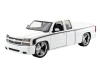 1/25 Motormax 2006 Chevrolet Silverado Extended Cab Custom (White) Diecast Car Models