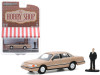 1992 Ford Crown Victoria LX Gold Metallic with Man in Suit Figurine "The Hobby Shop" Series 9 1/64 Diecast Model Car by Greenlight