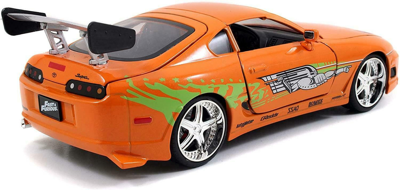 1/24 Jada Toyota Supra Orange Metallic with Brian Diecast Figurine "Fast & Furious" Movie Diecast Model Car