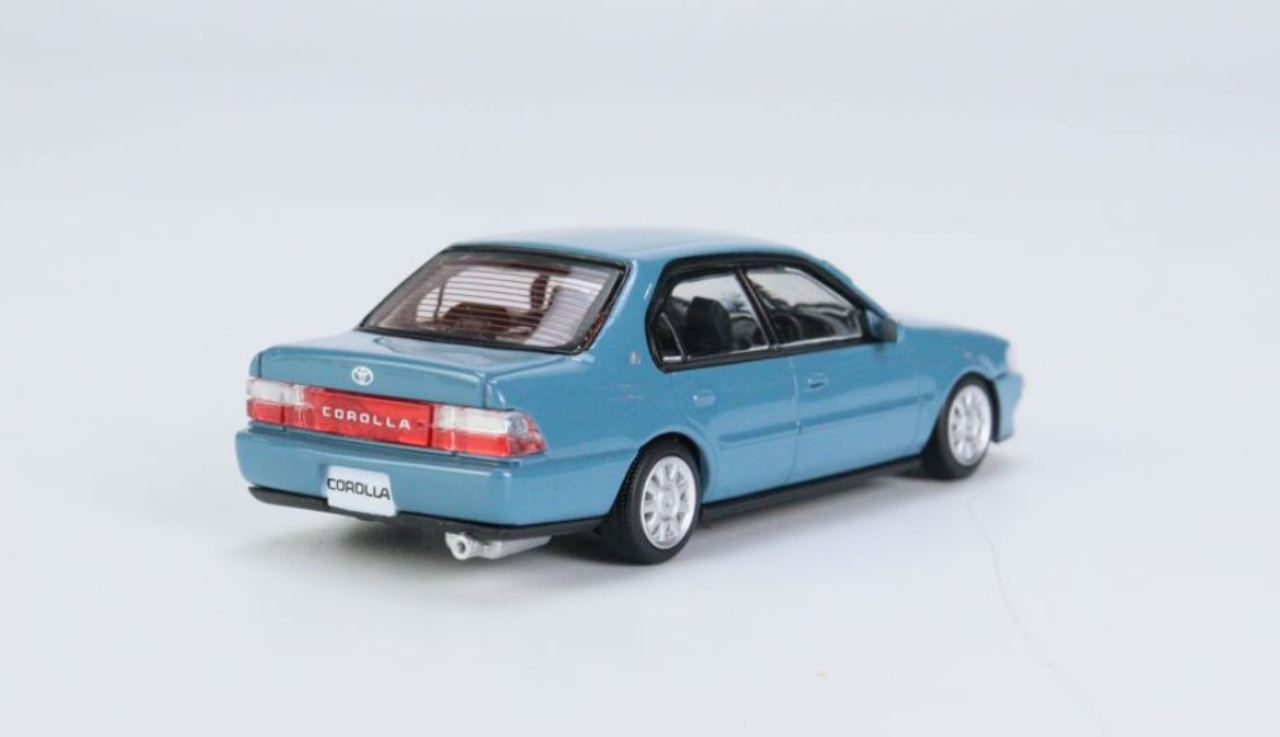  1/64 BM Creations Toyota 1996 Corolla AE100 Blue (RHD)