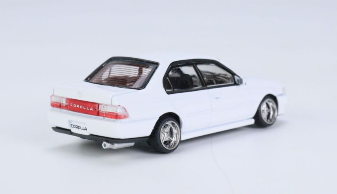  1/64 BM Creations Toyota 1996 Corolla AE100 White (LHD) 