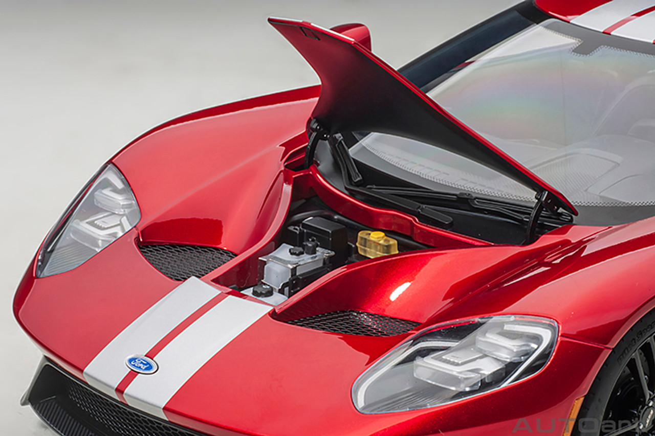 silver car with red stripes