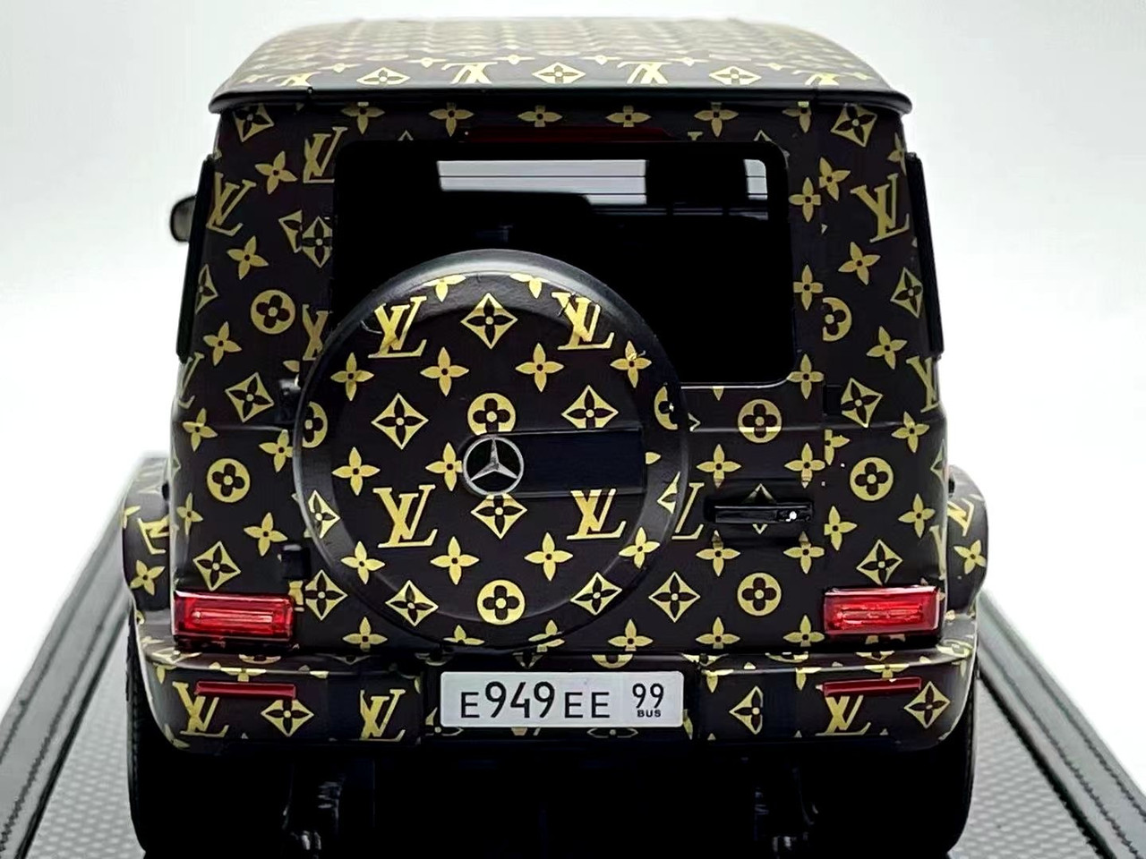 luxury car wrapped in louis vuitton print, car