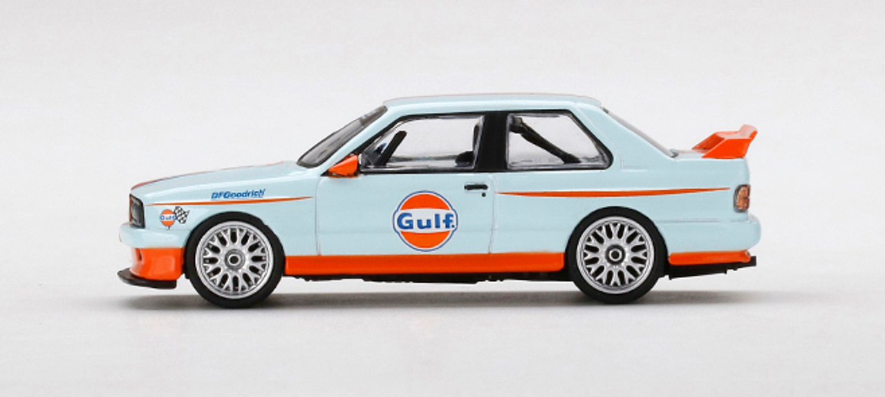 BMW M3 E30 #10 "Gulf Oil" Light Blue with Orange Stripes 1/64 Diecast Model Car by True Scale Miniatures