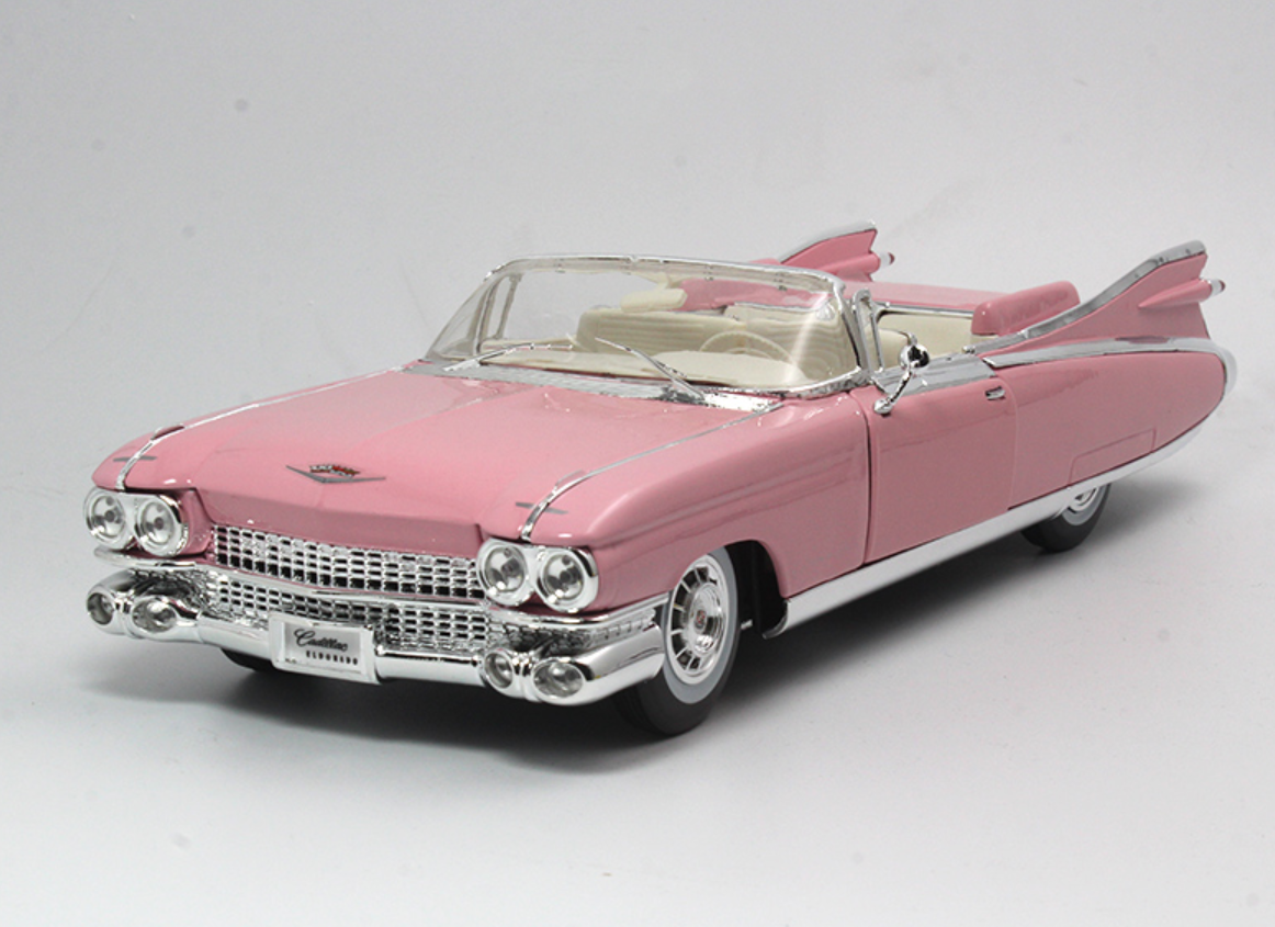 A Maisto 1:12th Scale Diecast Model Pink Cadillac Eldorado Biarritz