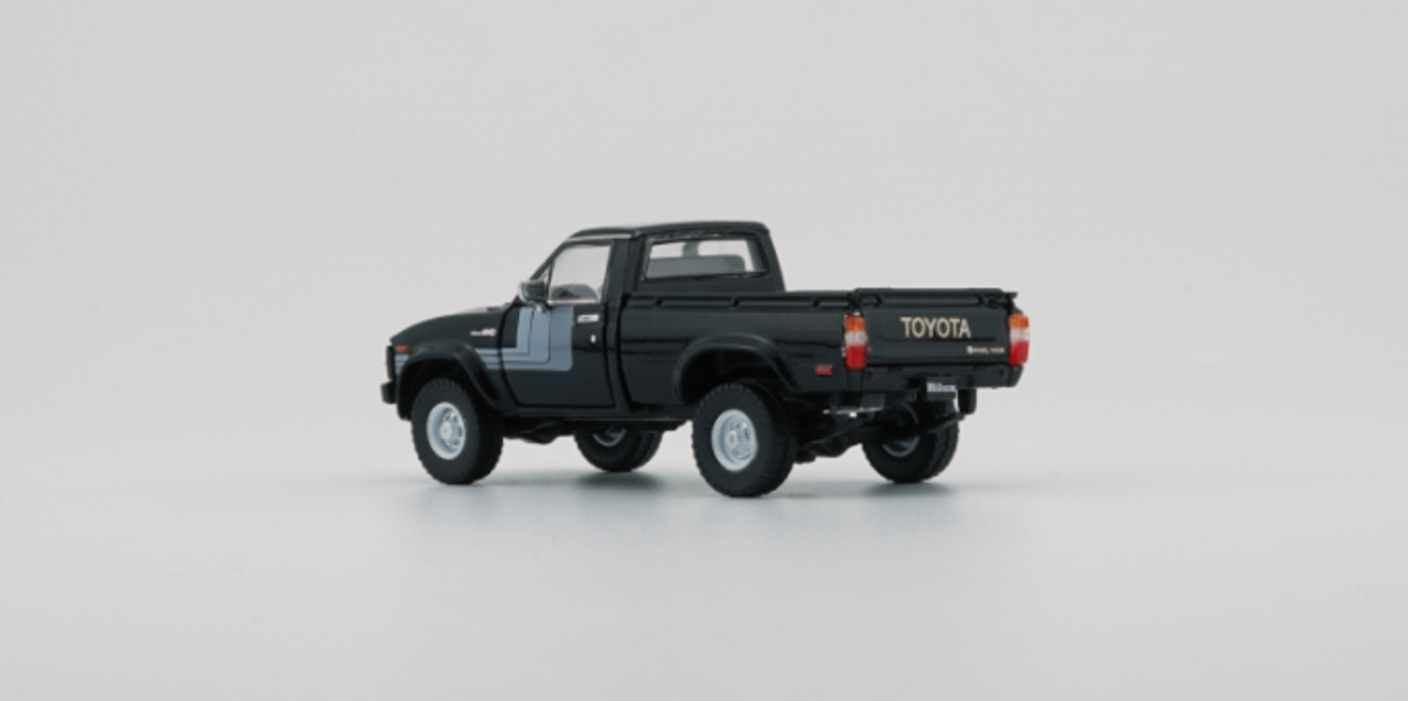 1/64 BM Creations Toyota Hilux - Ivory Black (2 door open)