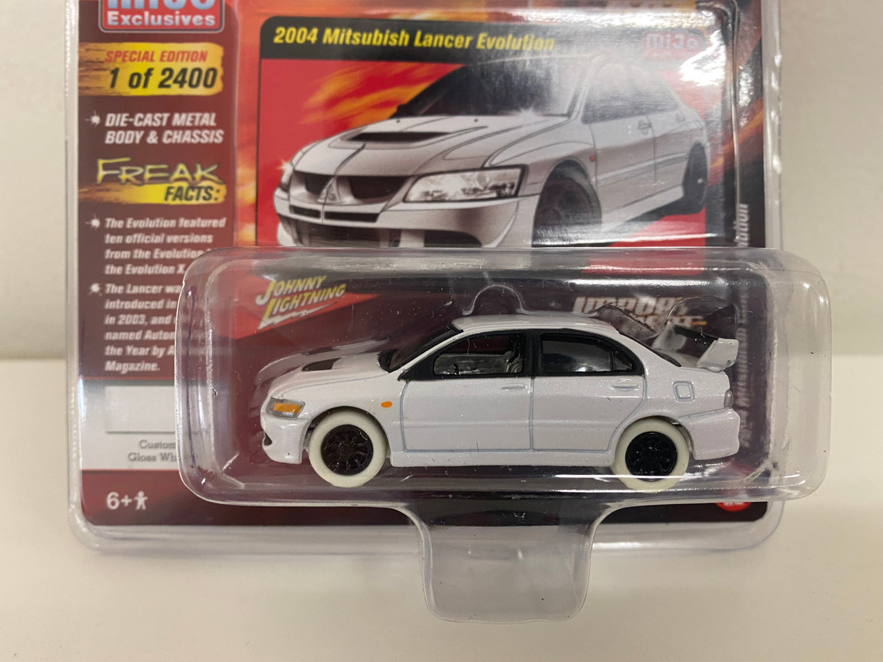 CHASE CAR 2004 Mitsubishi Lancer Evolution EVO 8 EVO VIII White with White Wheels "Import Heat" "Street Freaks" Series Limited Edition to 2400 pieces Worldwide 1/64 Diecast Model Car by Johnny Lightning