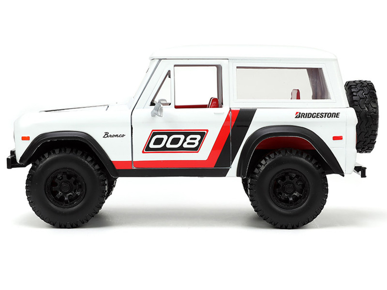 1973 Ford Bronco #008 White with Red and Black Stripes and Red Interior with Extra Wheels "Just Trucks" Series 1/24 Diecast Model Car by Jada