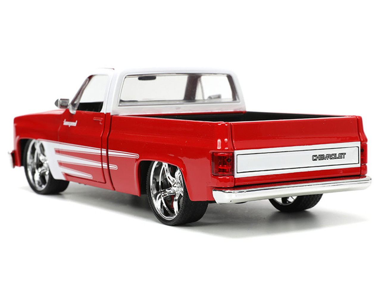 1985 Chevrolet C-10 Pickup Truck Red with White Top and Graphics with Extra Wheels "Just Trucks" Series 1/24 Diecast Model Car by Jada