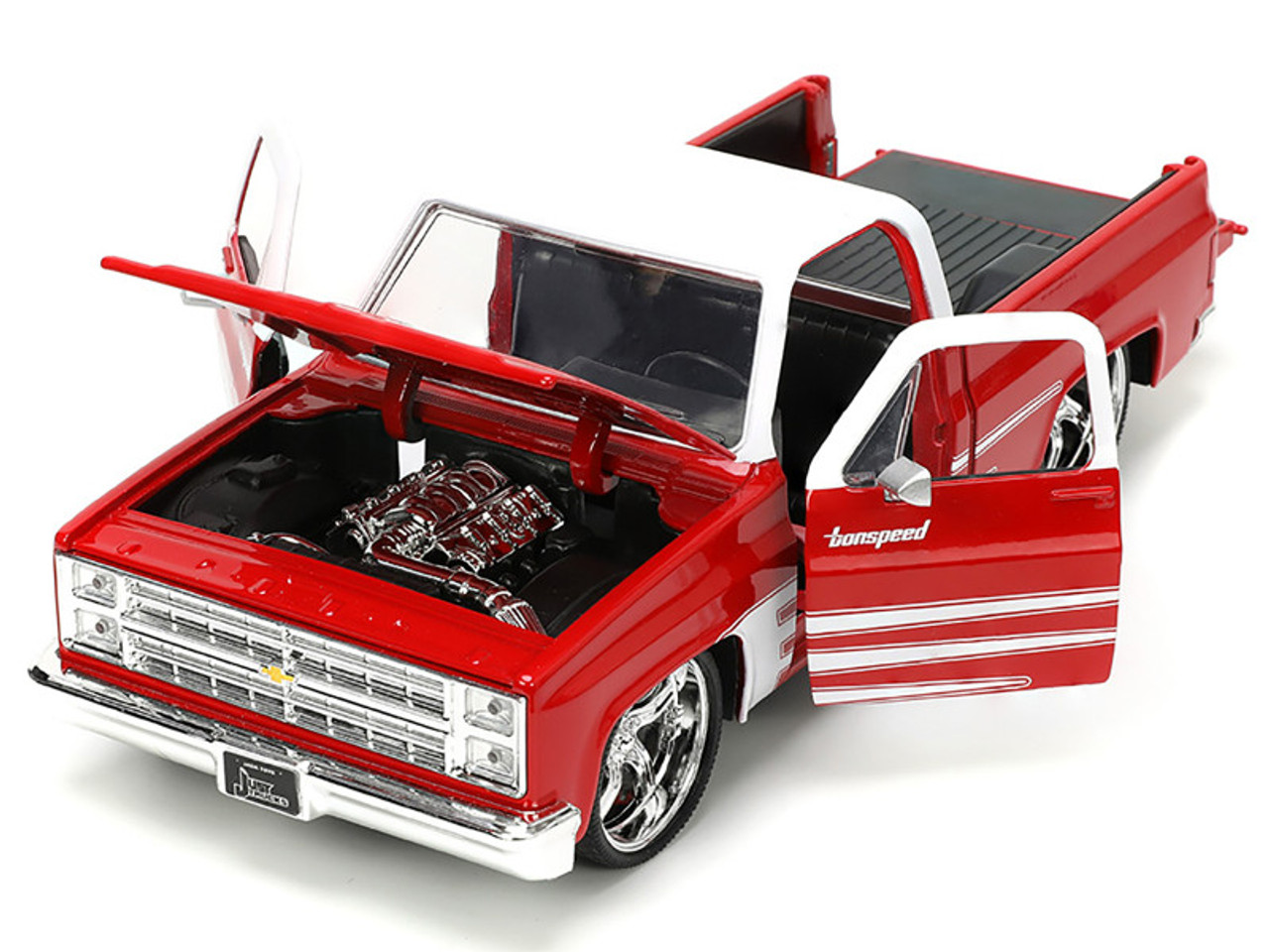 1985 Chevrolet C-10 Pickup Truck Red with White Top and Graphics with Extra Wheels "Just Trucks" Series 1/24 Diecast Model Car by Jada