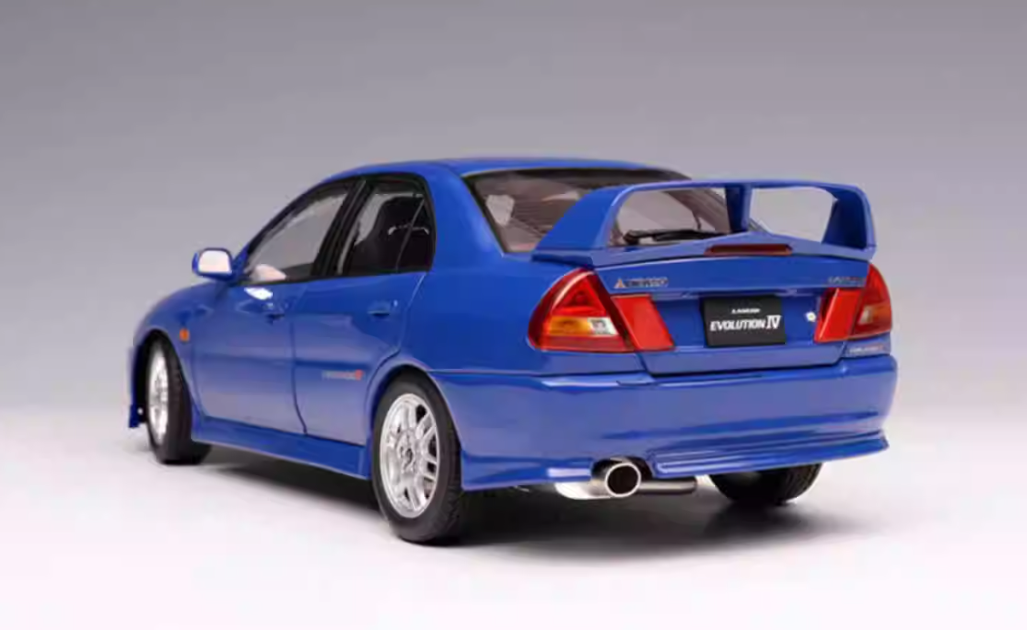 Miniature Motorhelix Mitsubishi Lancer Evo IV - Rouge Palma - 1/18 Avec Moteur