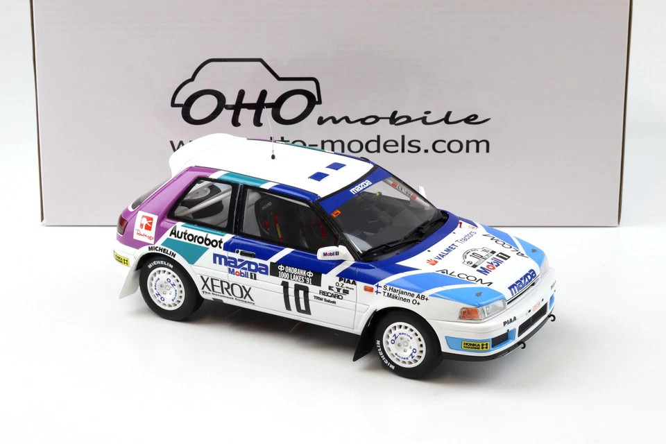 1/18 OTTO 1991 Mazda 323 GTX Gr.A 1000 Lakes Rally #10 Car Model