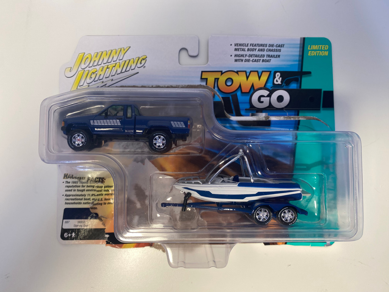 OPEN AS-IS 1/64 Johnny Lightning 1985 Toyota SR5 Pickup with Malibu Speed Boat Trailer (Blue) Diecast Models OPEN AS-IS 1/64 Johnny Lightning 1985 Toyota SR5 Pickup with Malibu Speed Boat Trailer (Blue) Diecast Models