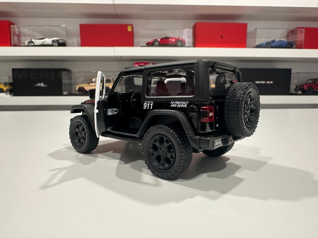 1/34 Kinsmart 2018 Jeep Wrangler 4X4 Police Diecast Car Model (no retail box) 1/34 Kinsmart 2018 Jeep Wrangler 4X4 Police Diecast Car Model (no retail box)