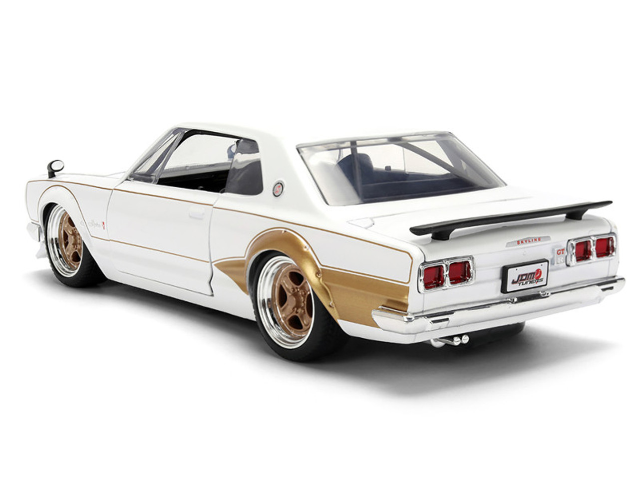 1971 Nissan Skyline 2000GT-R RHD (Right Hand Drive) White with Gold Graphics "JDM Tuners" Series 1/24 Diecast Model Car by Jada 1971 Nissan Skyline 2000GT-R RHD (Right Hand Drive) White with Gold Graphics "JDM Tuners" Series 1/24 Diecast Model Car by Jada