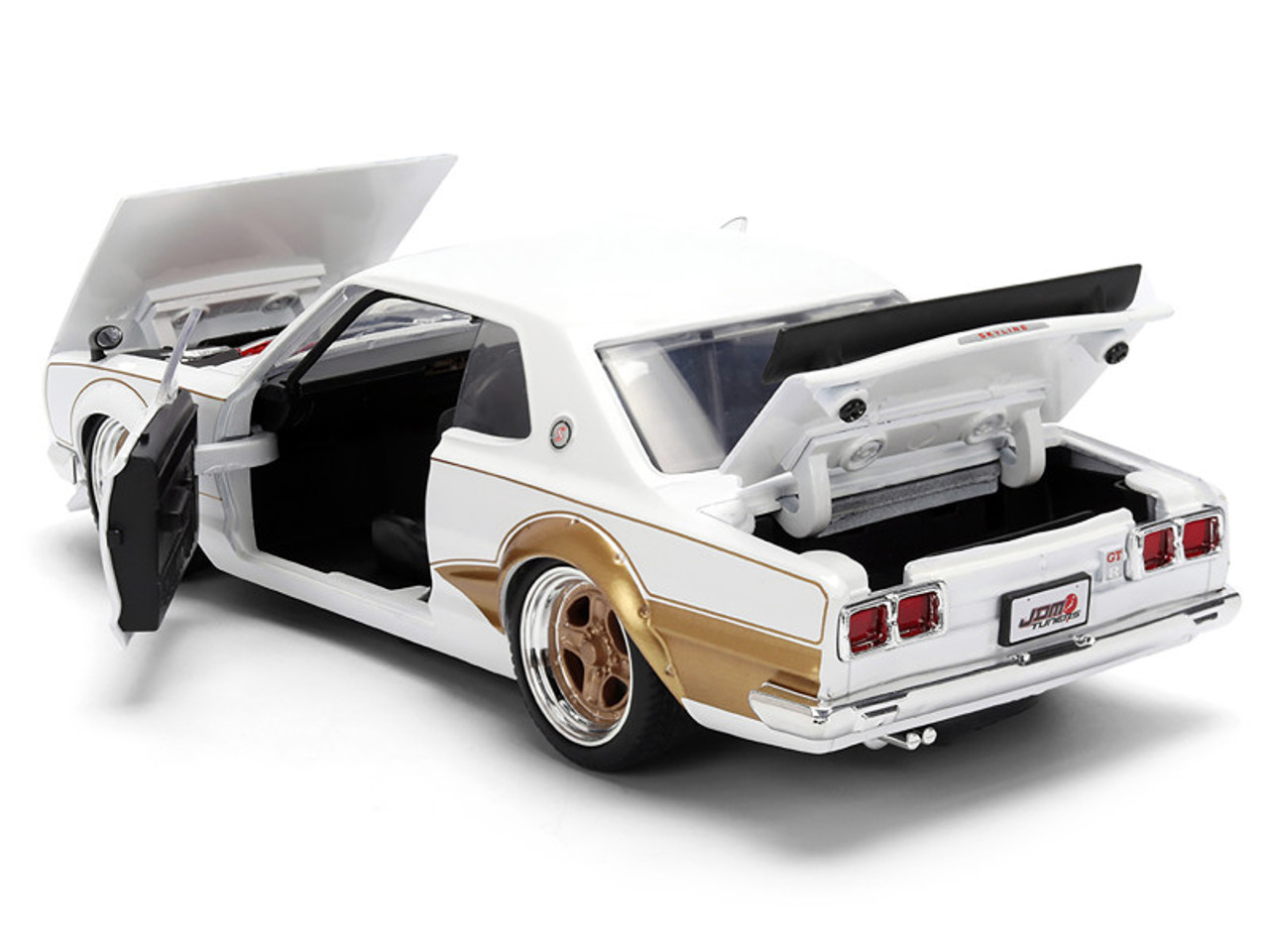 1971 Nissan Skyline 2000GT-R RHD (Right Hand Drive) White with Gold Graphics "JDM Tuners" Series 1/24 Diecast Model Car by Jada 1971 Nissan Skyline 2000GT-R RHD (Right Hand Drive) White with Gold Graphics "JDM Tuners" Series 1/24 Diecast Model Car by Jada