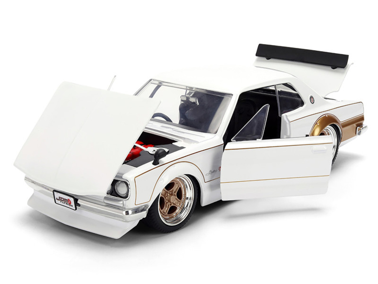 1971 Nissan Skyline 2000GT-R RHD (Right Hand Drive) White with Gold Graphics "JDM Tuners" Series 1/24 Diecast Model Car by Jada 1971 Nissan Skyline 2000GT-R RHD (Right Hand Drive) White with Gold Graphics "JDM Tuners" Series 1/24 Diecast Model Car by Jada