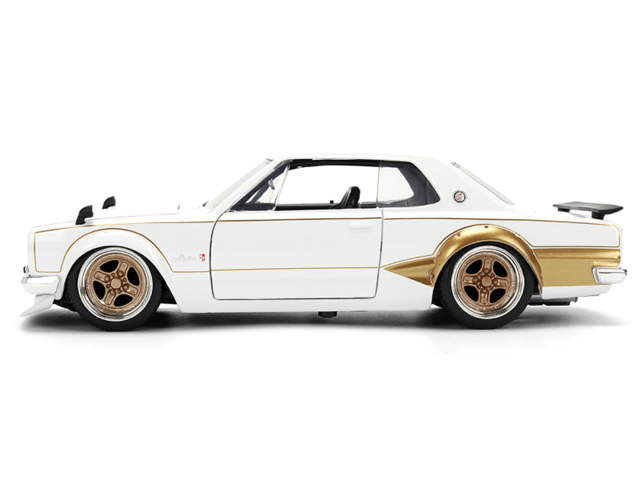 1971 Nissan Skyline 2000GT-R RHD (Right Hand Drive) White with Gold Graphics "JDM Tuners" Series 1/24 Diecast Model Car by Jada 1971 Nissan Skyline 2000GT-R RHD (Right Hand Drive) White with Gold Graphics "JDM Tuners" Series 1/24 Diecast Model Car by Jada