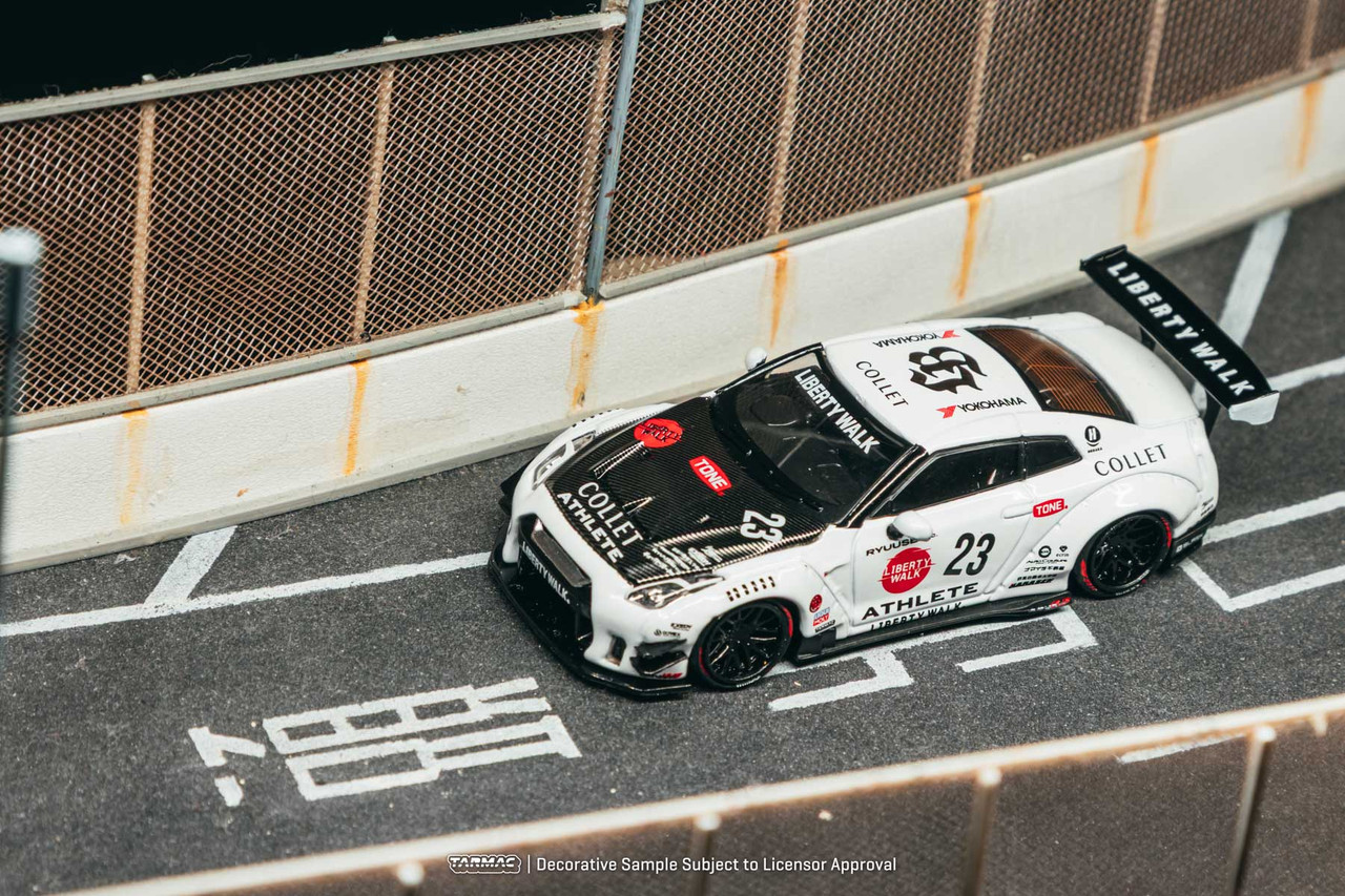 1/64 Tarmac Works Nissan Skyline GT-R R35 LB-Works Type 2 #23 (White) Diecast Car Model with Metal Oil Can Packging