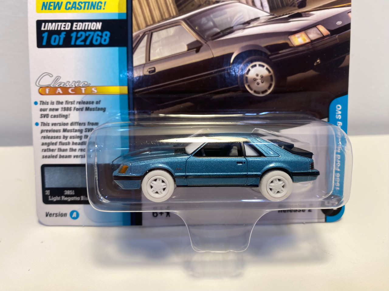 CHASE CAR 1/64 Johnny Lightning 1986 Ford Mustang SVO (Light Regatta Blue Metallic with Black Stripes) Diecast Car Model