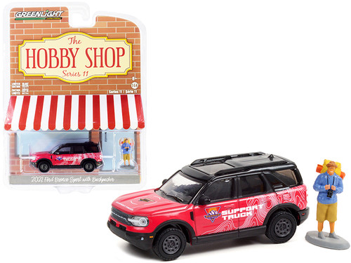 2021 Ford Bronco Sport Pink and Black "Off-Roadeo Adventure Support Truck" with Backpacker Figurine "The Hobby Shop" Series 11 1/64 Diecast Model Car by Greenlight